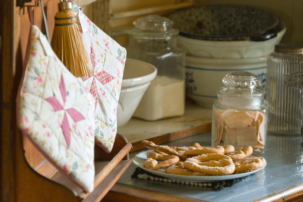 Country baking counter, bowls, and baked goods in jars